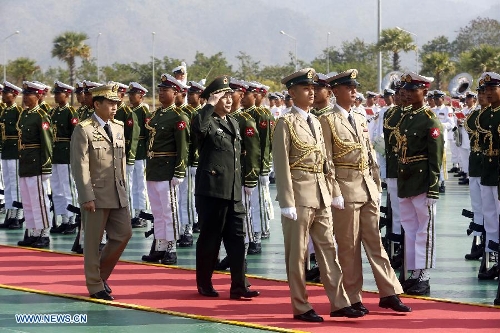 Deputy Chief of General Staff of the Chinese People 's Liberation Army Qi Jianguo (C) inspects the honor guards in Nay Pyi Taw, capital of Myanmar, on Jan. 20, 2013. Qi jianguo arrived here Saturday for the first China-Myanmar strategic security consultation. (Xinhua/U Aung) Related:China, Myanmar hold strategic security consultationNAY PYI TAW, Jan. 20 (Xinhua) -- Qi Jianguo, a senior officer of China's People's Liberation Army (PLA), hoped Myanmar may properly settle the issue of ethnic Kachin group through peaceful means as well as safeguard the tranquility along the China-Myanmar border areas.He made the remarks at the first Strategic Security Consultation between armed forces of China and Myanmar here on Sunday.&nbsp; Full story