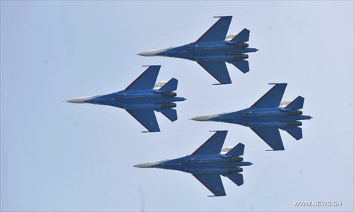 Four Su-27 fighter jets of Russian aerobatic tam 