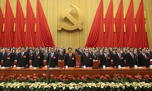 Hu Jintao (5th L), Jiang Zemin (5th R),?Wu Bangguo?(4th L),?Wen Jiabao?(4th R),?Jia Qinglin?(3rd L),?Li Changchun?(3rd R),?Xi Jinping?(2nd L),?Li Keqiang?(2nd R),?He Guoqiang?(1st L) and?Zhou Yongkang?(1st R) attend the opening ceremony of the 18th National Congress of the Communist Party of China (CPC) at the Great Hall of the People. The congress opened in Beijing on Thursday. Photo: Xinhua