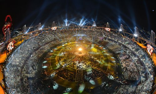 A picture taken with a robotic camera shows a general view of the opening ceremony of the London 2012 Olympic Games on Friday at the Olympic Stadium in London. Photo: AFP 