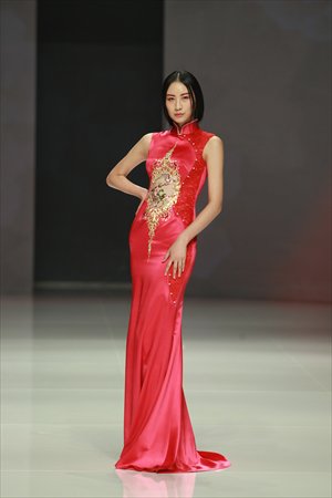 A model wears a dress from NE-Tiger 