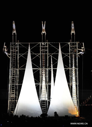 Performers participate in the opening ceremony of 2nd International Military Sports Council(CISM) World Winter Games at Annecy, France, March 25, 2013. (Xinhua/Wang Siwei) 