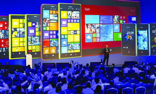 Nokia CEO, Canadian Stephen Elop, unveils Nokia's latest products including its first phablets - extra-large phones - and its first tablet computer during an event on Tuesday in Abu Dhabi. Photo: CFP