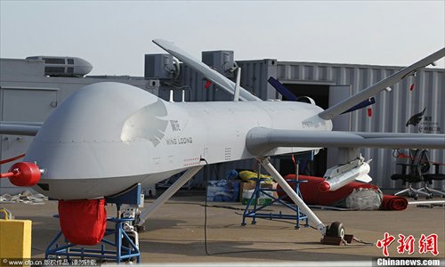 The unmanned plane Wing Loong, designed by the Aviation Industry Corporation of China (AVIC), is exhibited at the Airshow China 2012 in Zhuhai, Guangdong Province on Monday. The show, now in its ninth year, runs until November 18. Photo: CFP
