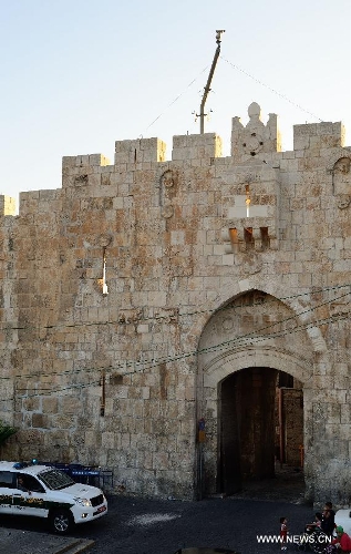 This photo taken on July 3, 2013 shows the Lions' Gate of Jerusalem's Old City. Old City of Jerusalem and its Walls were recorded on the United Nations Educational, Scientific and Cultural Organization's World Heritage list in 1982. (Xinhua/ Yin Dongxun)