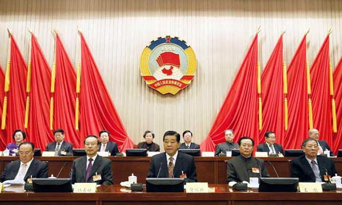 Jia Qinglin (C front), chairman of the Chinese People's Political Consultative Conference (CPPCC) National Committee, attends the closing meeting of the 20th session of the Standing Committee of the 11th CPPCC National Committee in Beijing, capital of China, February 1, 2013. Photo: Xinhua