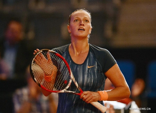 Petra Kvitova of the Czech Republic greets the audience after the first round match of Porsche Tennis Grand Prix against Annika Beck of Germany in Stuttgart, Germany, on April 24, 2013. Petra Kvitova won 2-1. (Xinhua/Ma Ning) 