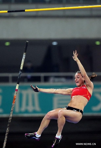 Russia's Yelena Isinbayeva competes during the women's pole vault at the IAAF Diamond League Athletics meet in Shanghai, east China, May 18, 2013. Isinbayeva won the first place of the event with 4.70 meters. (Xinhua/Li Ming) 