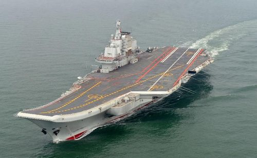 Photo taken in May 2012 shows a Chinese aircraft carrier cruising for a test on the sea. China's first aircraft carrier was delivered and commissioned to the Navy of the Chinese People's Liberation Army on September 25, 2012. The carrier, with the name 