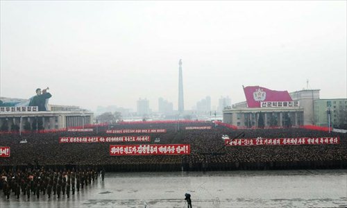 Military officers, soldiers and civilians gather to celebrate the successful launch of the Kwangmyongsong-3 satellite in Pyongyang, capital of the Democratic People's Republic of Korea (DPRK), on Dec. 14, 2012. According to the DPRK's official media KCNA, a Unha-3 rocket carrying the second version of the Kwangmyongsong-3 satellite blasted off from the Sohae Space Center in Cholsan County, North Phyongan Province, on Dec. 12. Photo: Xinhua