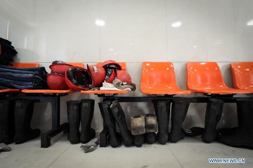 Photo taken on March 30, 2013 shows the clothes-changing area of the mine where a gas blast happened at Babao Coal Mine in Jiangyuan District in the city of Baishan, northeast China's Jilin Province. Twenty-eight people were confirmed dead and 13 others injured during the colliery gas blast which happened around 10:40 p.m. (1440 GMT) on March 29. The injuries of the 13 were not life threatening, said a spokesman with the provincial work safety and supervision bureau. Rescue work has been finished, and the cause of the accident is under investigation. (Xinhua/Xu Chang) 