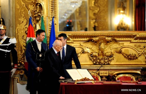 Italian President Giorgio Napolitano (front) arrives to attend the swearing-in ceremony in Rome, Italy, on April 28, 2013. Italy's new cabinet, lead by Prime Minister Enrico Letta, was sworn in on Sunday, starting their task for breaking the impasse the country had been locked for months. (Xinhua/Xu Nizhi)  