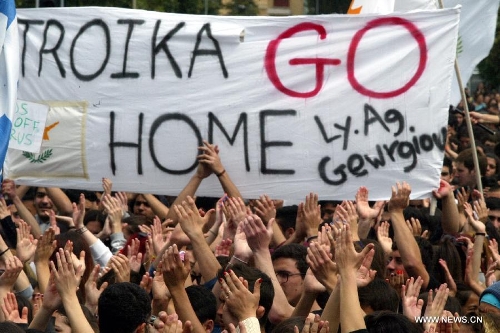 Ordinary Cypriots step in the streets to protest against the massive 