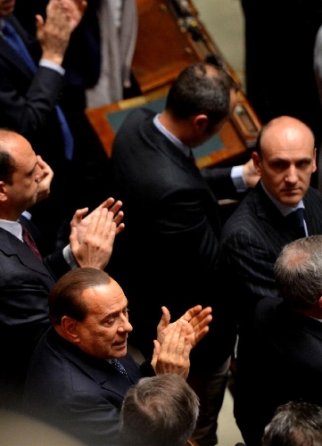 Silvio Berlusconi (front L), the leader of the freedom of people, applauds the winning of Giorgio Napolitano in Rome, Italy, on April 20, 2013. Italian President Giorgio Napolitano on Saturday won election for a second mandate in a move to solve Italy's political impasse. (Xinhua/Xu Nizhi) 