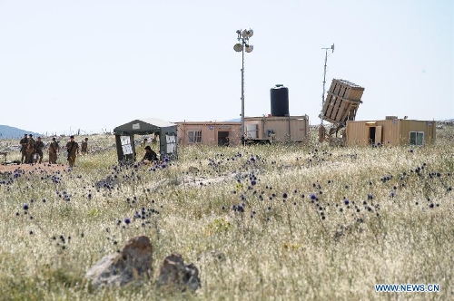 Israel Defense Forces' Iron Dome, a short-range missile defence system, is positioned on a hill near Zefat, at the Golan Heights on May 5, 2013. The Israeli military deployed two batteries of the Iron Dome anti-rocket defense system to northern Israel following an escalation in tensions with Syria, local media reported Sunday. (Xinhua/Jini)