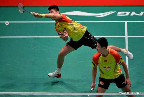 Cai Yun and Fu Haifeng (Rear) of China compete during the 2013 Sudirman Cup world mixed team badminton championship against Indonesia's Hendra Setiawan and Angga Pratama in Kuala Lumpur, Malaysia, on May 21, 2013. The Chinese pair won 2-1. (Xinhua/Chen Xiaowei) 