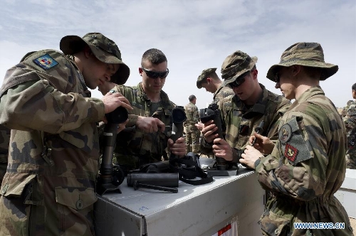 Photo released by the French Defense Ministry shows French soldiers getting prepared at the Bamako military airport as part of the 