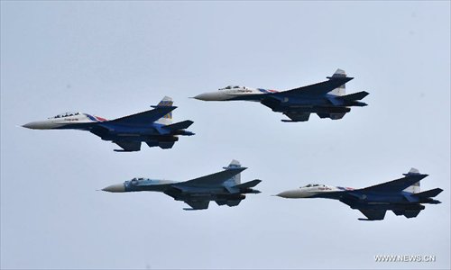 Four Su-27 fighter jets of Russian aerobatic tam 