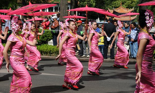 Dai nationality people dressed in their traditional costumes.Photo:CFP