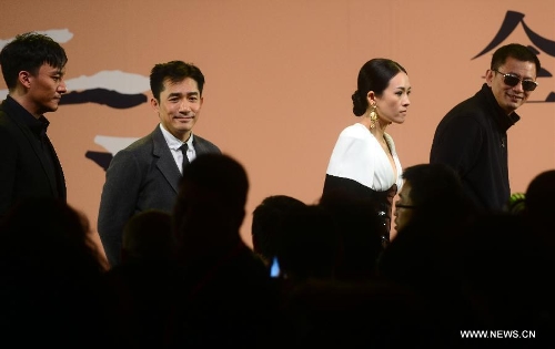 Hong Kong director Wong Kar Wai (R) and cast members Chang Chen, Tony Leung and Zhang Ziyi (L to 2nd R) attend the premiere ceremony of Wong's new film 