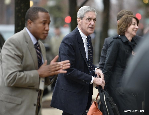 FBI Director Robert Mueller arrives for testifing before the Senate Select Intelligence Committee during a hearing on 