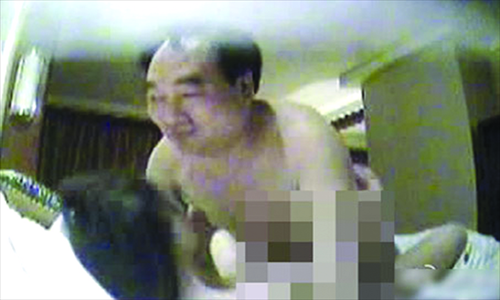 Inset: A still image from the sex video that shows Lei Zhengfu, the former Party chief of Chongqing's Beibei district and Zhao Hongxia Photo: njdaily.cn