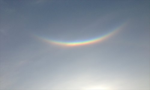 A circumzenithal arc forms in the sky above Huangpu district Monday morning. Photos: Courtesy of Shirley Han