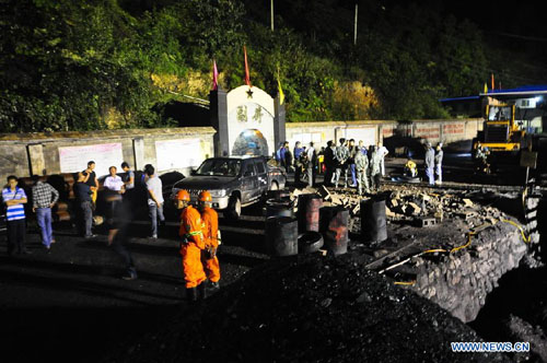 Photo taken on September 12, 2012 shows the accident site of Guba Coal Mine in Longchang Township of Fuquan City, southwest China's Guizhou Province. A coal mine flooding happened here at about 11:30 pm Tuesday, when 41 miners were working underground. Eight miners were trapped in the coal mine. The rescue operation is under way. Photo: Xinhua