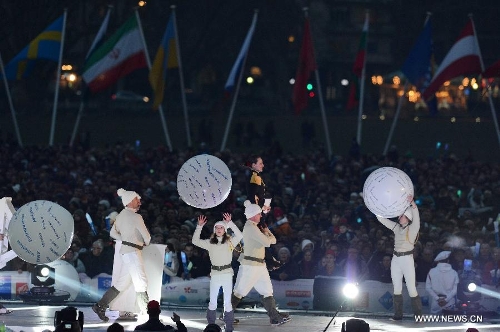 Performers participate in the opening ceremony of 2nd International Military Sports Council(CISM) World Winter Games at Annecy, France, March 25, 2013. (Xinhua/Wang Siwei) 
