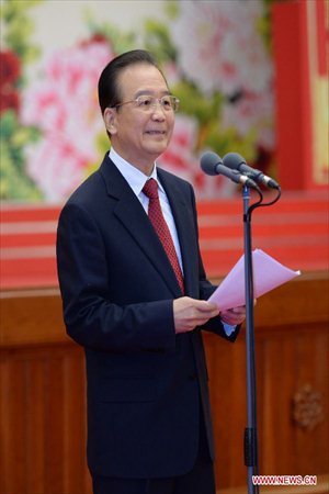 Chinese Premier Wen Jiabao addresses a Spring Festival reception held by the Central Committee of the Communist Party of China and the State Council (Cabinet) at the Great Hall of the People in Beijing, capital of China, Feb. 8, 2013. Photo: Xinhua