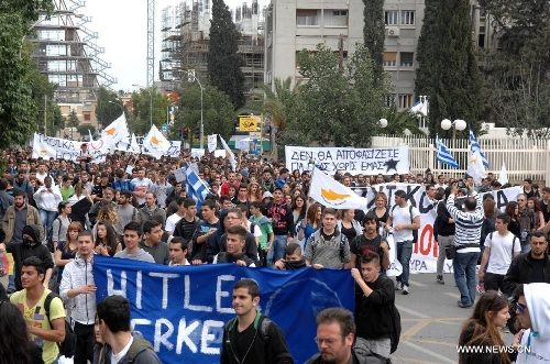 Ordinary Cypriots step in the streets to protest against the massive 
