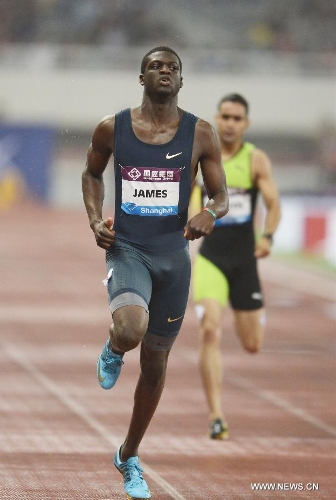 Grenada's Kirani James competes in the men's 400 meters race during the IAAF Diamond League Athletics meet in Shanghai, east China, May 18, 2013. Kirani James won the first place of the event in 44.02 seconds.(Xinhua/Li Jundong) 