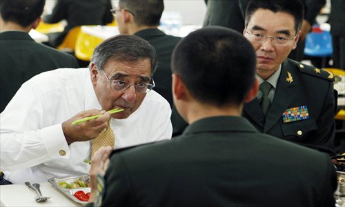 US Defense Secretary Leon Panetta has lunch with cadets in the mess hall at the People's Liberation Army Engineering Academy of Armored Forces in Beijing on Wednesday. Photo: AFP
