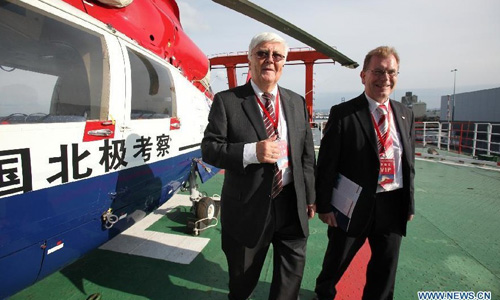 Two Iceland officials visit China's icebreaker Xuelong, or 
