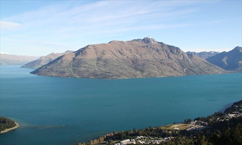 Water and mountains dominate the picture-postcard landscape in Queenstown.