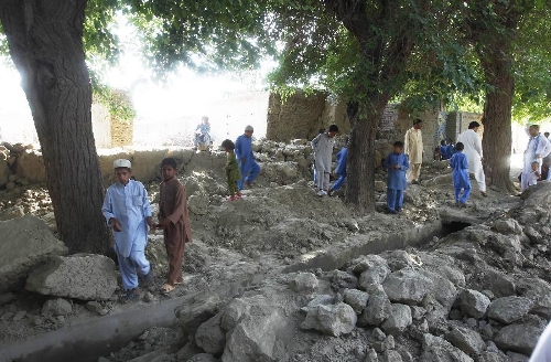 Afghan children are seen among ruins after an earthquake in east Afghanistan's Nangarhar province, on April 24, 2013. A tremor jolted Afghan capital Kabul and its eastern provinces at 01: 55 p.m. local time on Wednesday, claiming the lives of three people and injuring 70 others, an official said. (Xinhua/Tahir Safi)