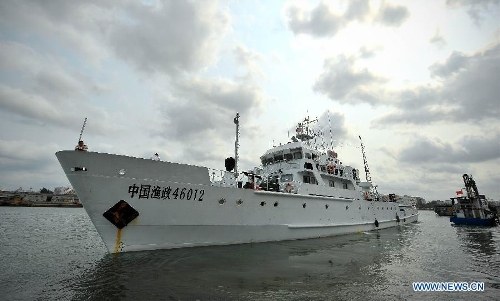 A fishery administration ship leaves the Xingang Port of Haikou, capital of south China's Hainan Province, March 26, 2013, to conduct fishery patrol missions in waters off the Xisha Islands and Huangyan Islands in the South China Sea. (Xinhua/Guo Cheng) 