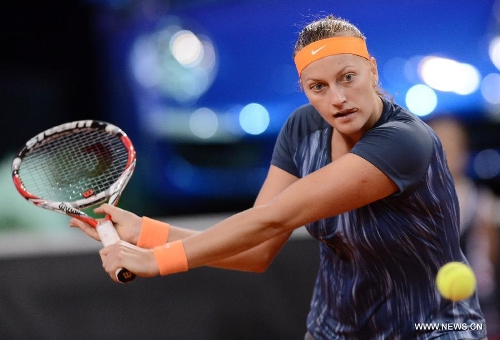 Petra Kvitova of the Czech Republic returns the ball during the first round match of Porsche Tennis Grand Prix against Annika Beck of Germany in Stuttgart, Germany, on April 24, 2013. Petra Kvitova won 2-1. (Xinhua/Ma Ning) 