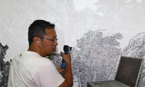 Taiwanese artist Chen Chun-Hao simulates a traditional Chinese ink painting 