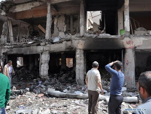 Photo taken on May 11, 2013 shows the site of an explosion in the town of Reyhanli, in the southern Turkish province of Hatay. At least 40 people were killed and 100 others injured after explosions shook a Turkish town on Saturday near the border with Syria, Turkish Interior Minister Muammer Guler said. (Xinhua/NTV) 