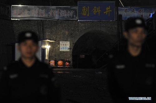 Photo taken on March 13, 2013 shows the site of the accident in Shuicheng County, southwest China's Guizhou Province. Twenty-one miners were killed and four others were missing in a coal and gas outburst Tuesday evening at Machang Coal Mine which belongs to Gemudi Company of Guizhou Water & Mining Group. Eighty-three miners were working underground when the accident took place, and 58 of them managed to get to the ground safely. (Xinhua/Ou Dongqu) 