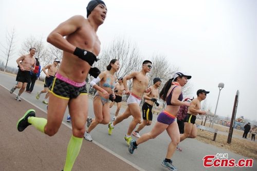 People in half-naked run to promote green life in Beijing - Global Times