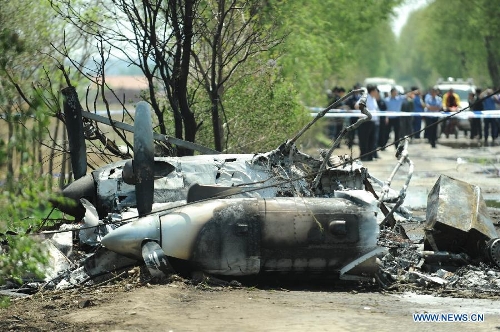 Photo taken on May 16, 2013 shows the remains of a light plane after it failed to take off at Taoxian Airport in Shenyang, capital of northeast China's Liaoning Province. Three people on board were injured in the accident on Thursday. (Xinhua/Pan Yulong) Related:Three injured in plane's failed take-off in NE ChinaSHENYANG, May 16 (Xinhua) -- Three people on board a light plane were injured in the aircraft's aborted take-off at an airport in Shenyang, capital of northeast China's Liaoning Province, Thursday morning, the airport sources said.The injured have been rushed to hospital. Full story