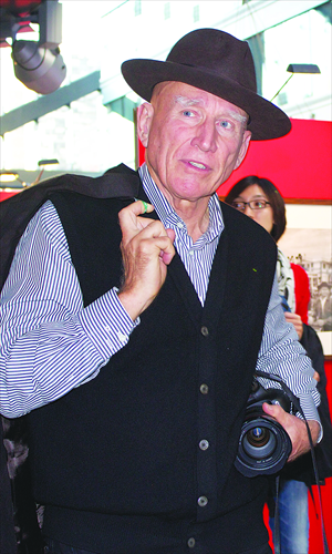 Salgado at his exhibition at Galleria illy in Beijing Photo: Courtesy of Sebasti?o Salgado
