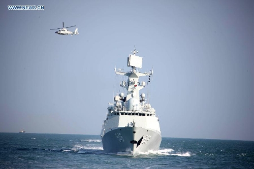 A Chinese People's Liberation Army (PLA) Navy fleet has set off from a military port in east China's Qingdao City for regular open-sea training in the West Pacific Ocean, military sources revealed Wednesday. (Xinhua/Li Yun)Related:Chinese navy depart for West Pacific trainingMISSILE DESTROYER QINGDAO, Jan. 30 (Xinhua) -- A Chinese People's Liberation Army (PLA) Navy fleet has set off from a military port in east China's Qingdao City for regular open-sea training in the West Pacific Ocean, military sources revealed Wednesday.The fleet departed Tuesday morning and comprises three ships -- the missile destroyer Qingdao and the missile frigates Yantai and Yancheng -- carrying three helicopters, all from the North China Sea Fleet under the PLA Navy.Full story