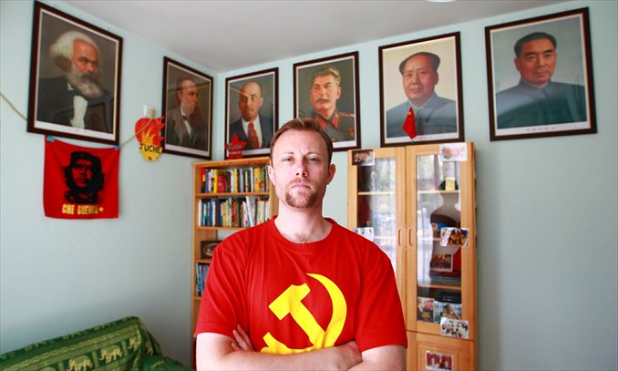 Iain Inglis stands in his room dedicated to Communist memorabilia. Photo: Courtesy of Iain Inglis
