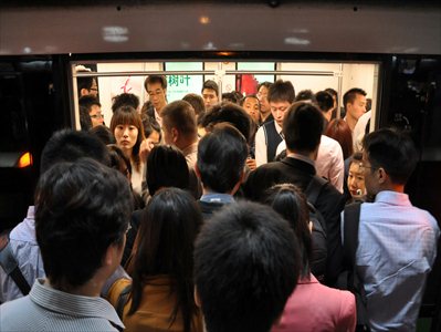 A protestor carries a sign that reads 