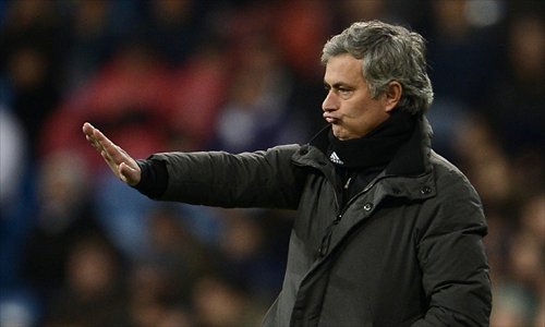 Real Madrid's Portuguese coach Jose Mourinho gestures during the match against Mallorca at the Santiago Bernabeu stadium in Madrid on March 16. Photo: AFP