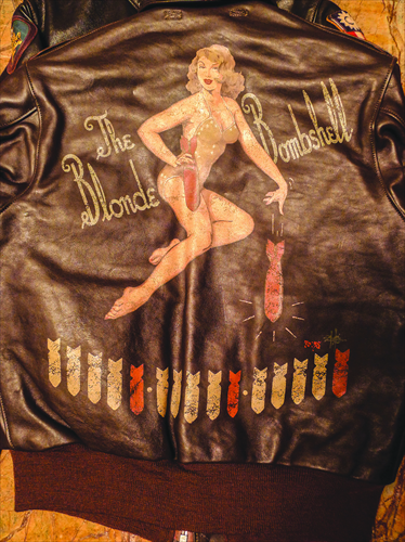 Bombshells below images of a Native American chief and scantily-clad woman indicate the number of bombing missions pilots carried out.