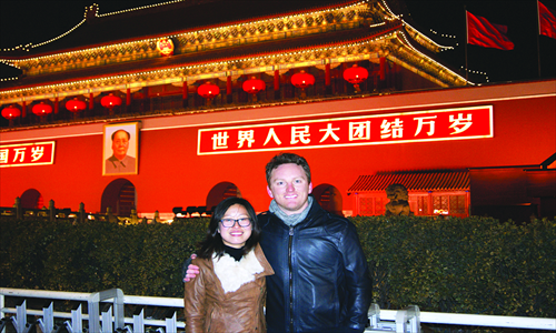 5. An evening stroll in downtown Beijing isn't complete without a photo featuring the iconic backdrop of the Tiananmen Rostrum. 
